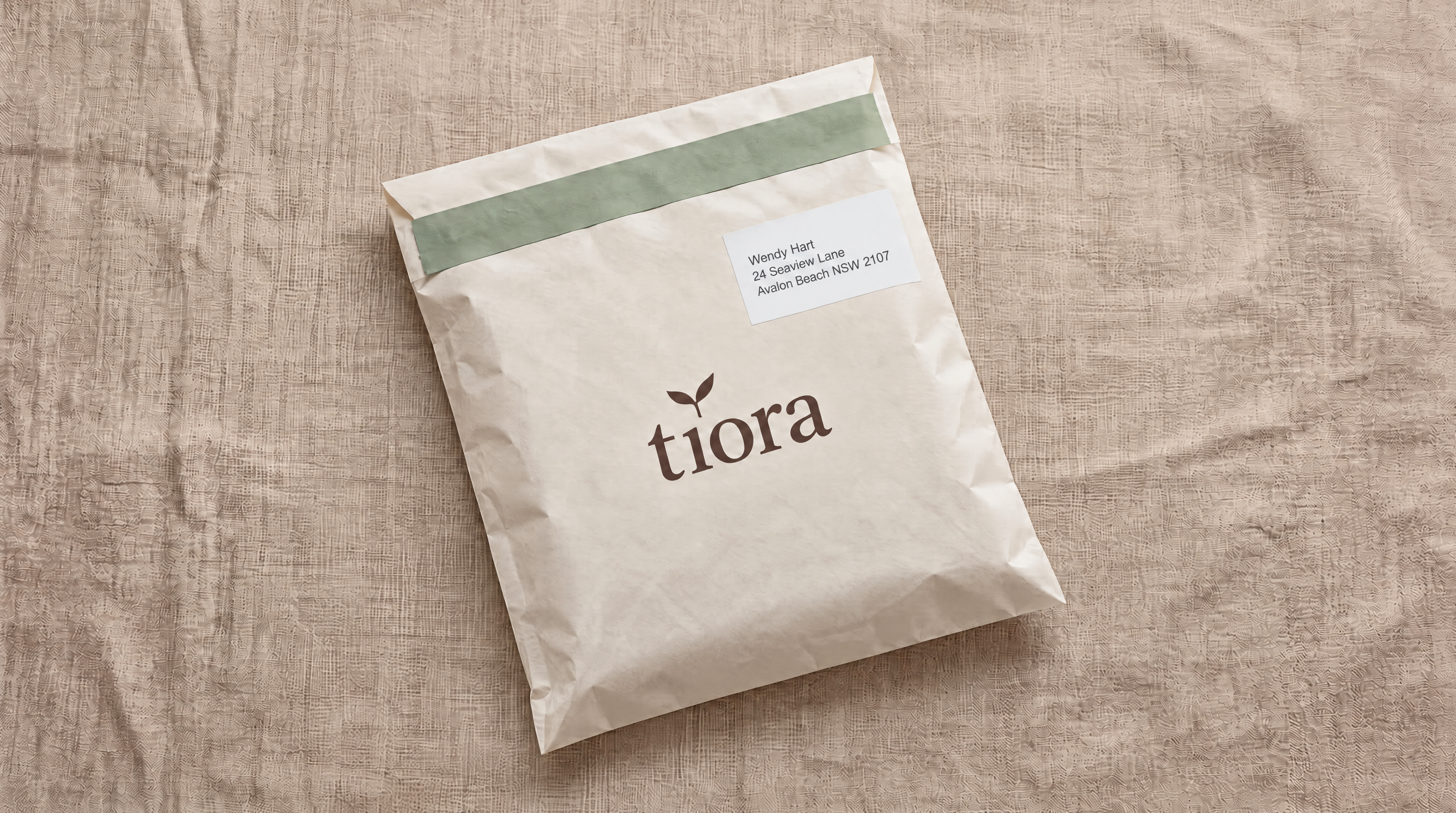 A Tiora return package with an address label